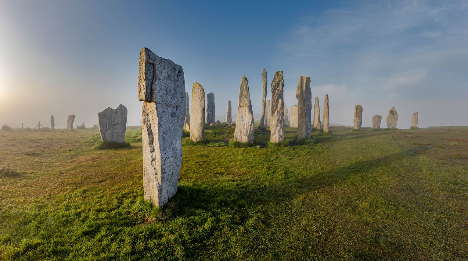 Ancient standing stones on Isle of Lewis at sunrise