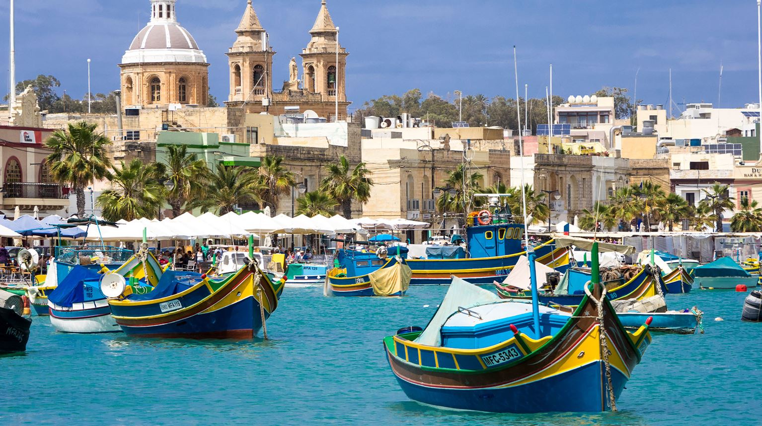 Traditional fishing boat moored in Malta Harbour