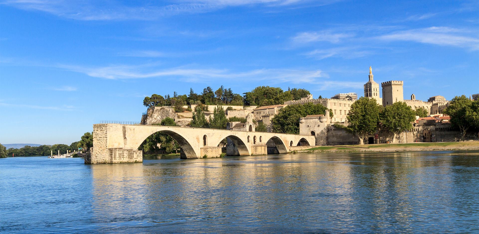 St Benezet Bridge reflected on the Rhône River, France  