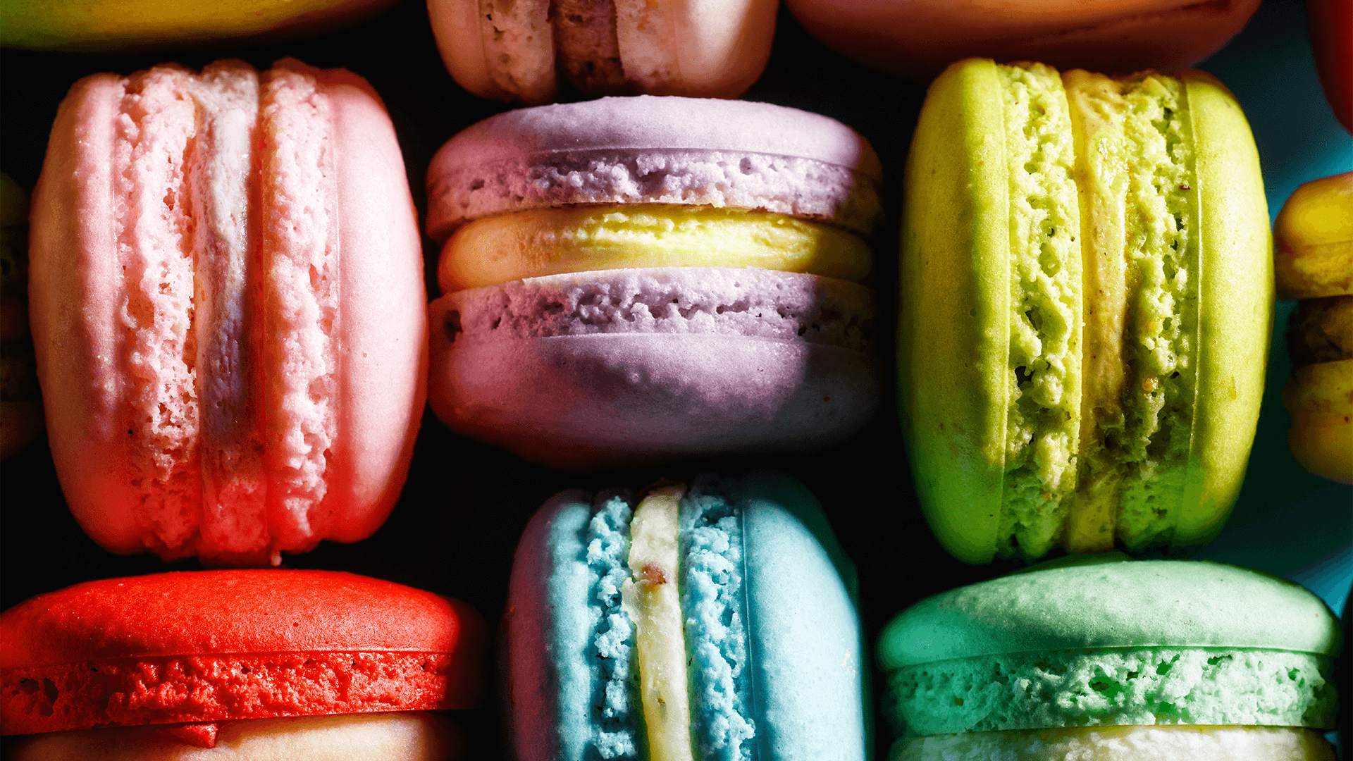 Close up of brightly coloured macarons