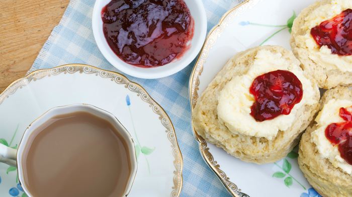 Traditional scones with cream and jam served with cream tea 