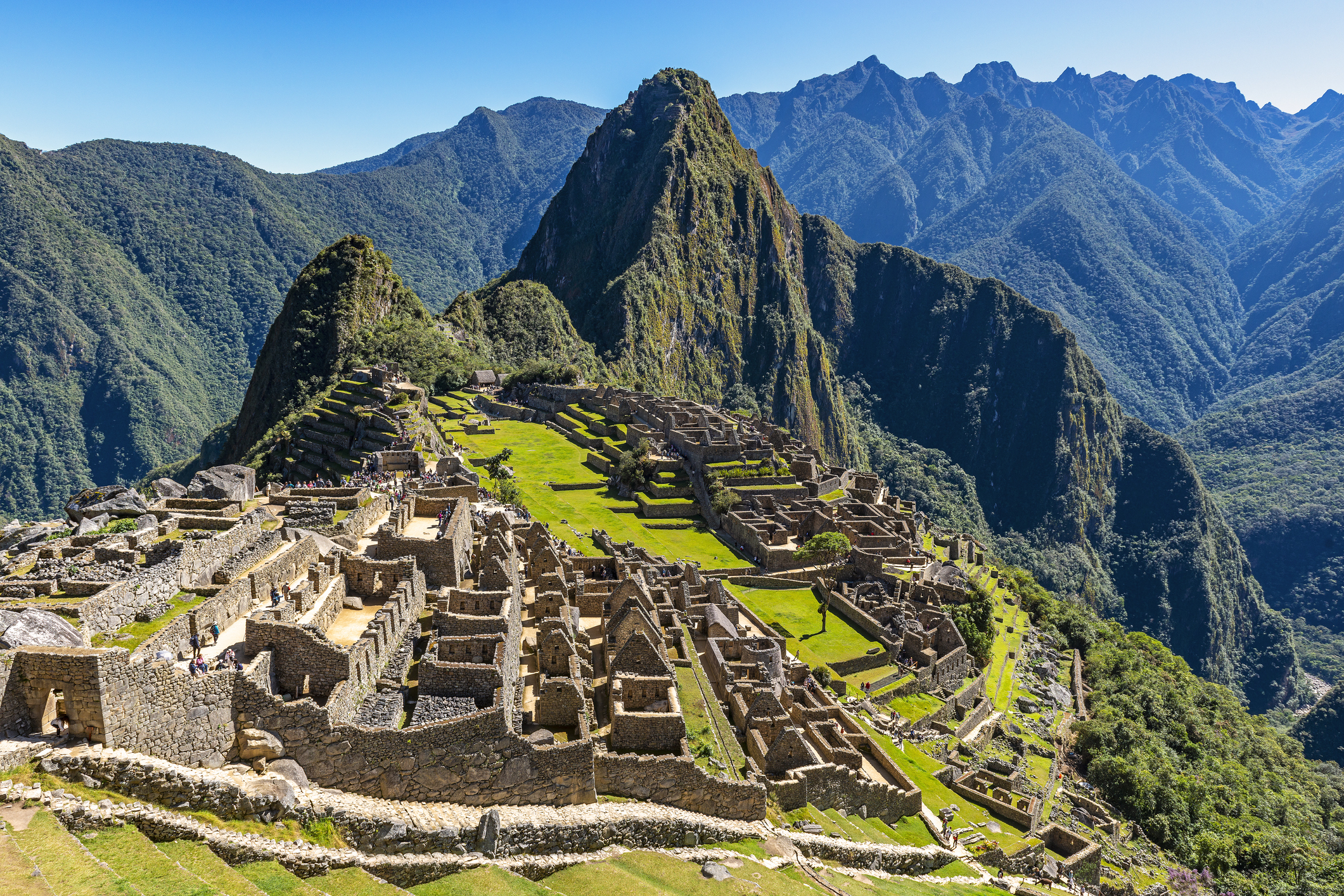 Overlooking from the top of Machu Picchu Inca Ruins and green mountains, Peru, South America.