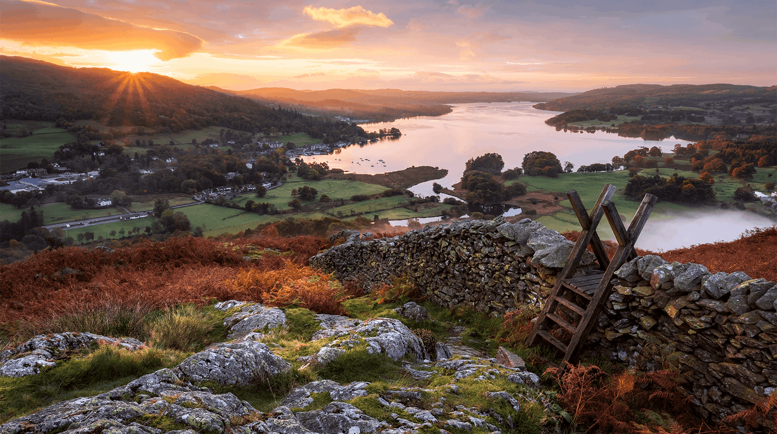 Sunrise over the rolling hills near Windermere Lake