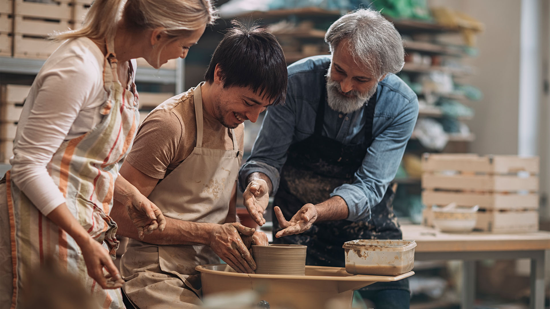 Person Shaping Clay On Pottery Wheel