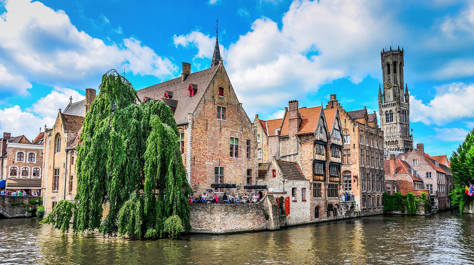 Canals surrounding old Bruges Belgium and the Belfry