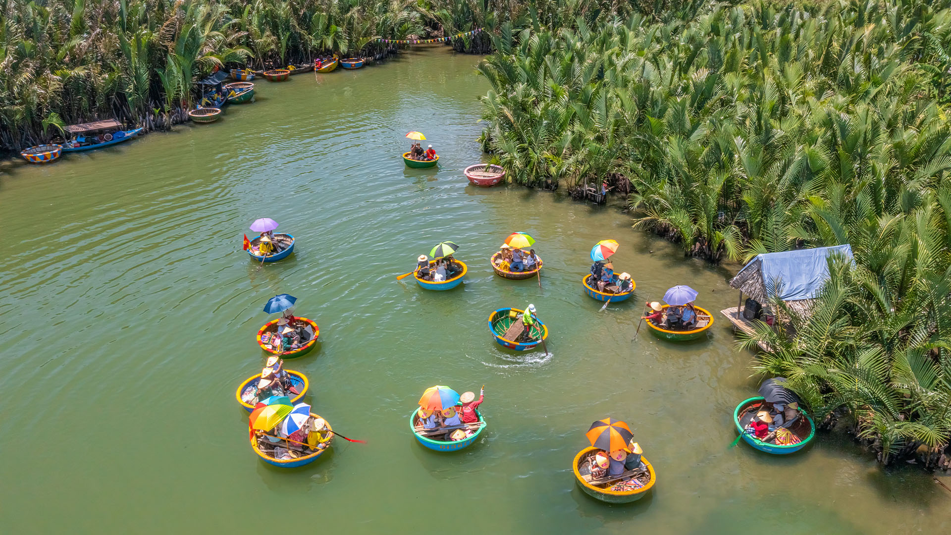 Aerial view of tourists riding in river basket boats