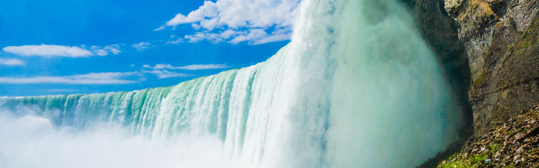 Side view from the middle of Niagara Falls and partial hill, ON, Canada.