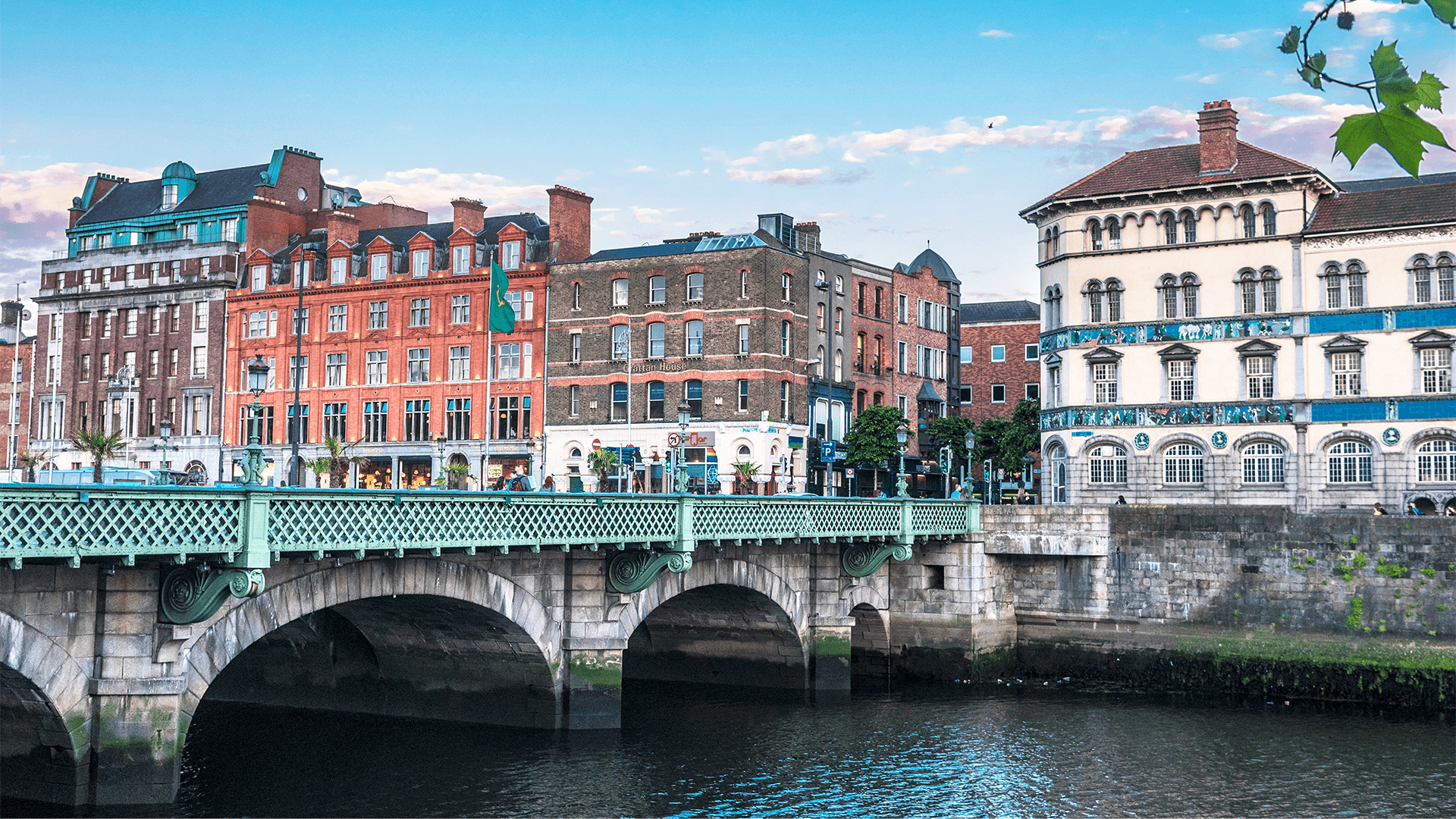 Historic Dublin buildings line the riverbank