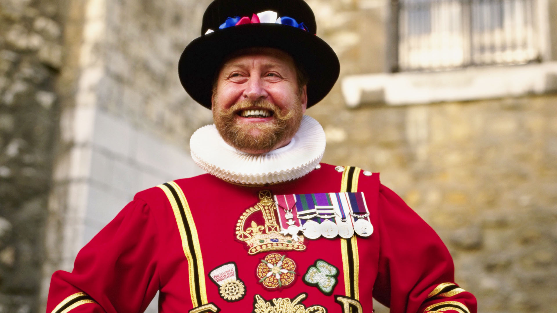 Smiling Beefeater at the Tower of London