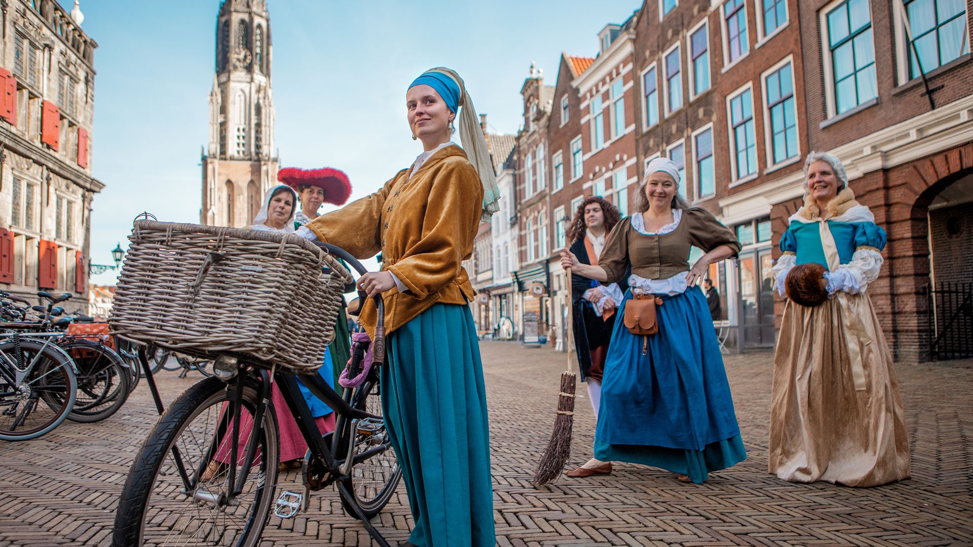 Six female tour guides in traditional Dutch clothes