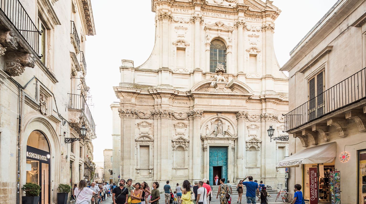 Pedestrians near the ornate Church of Saint Irene