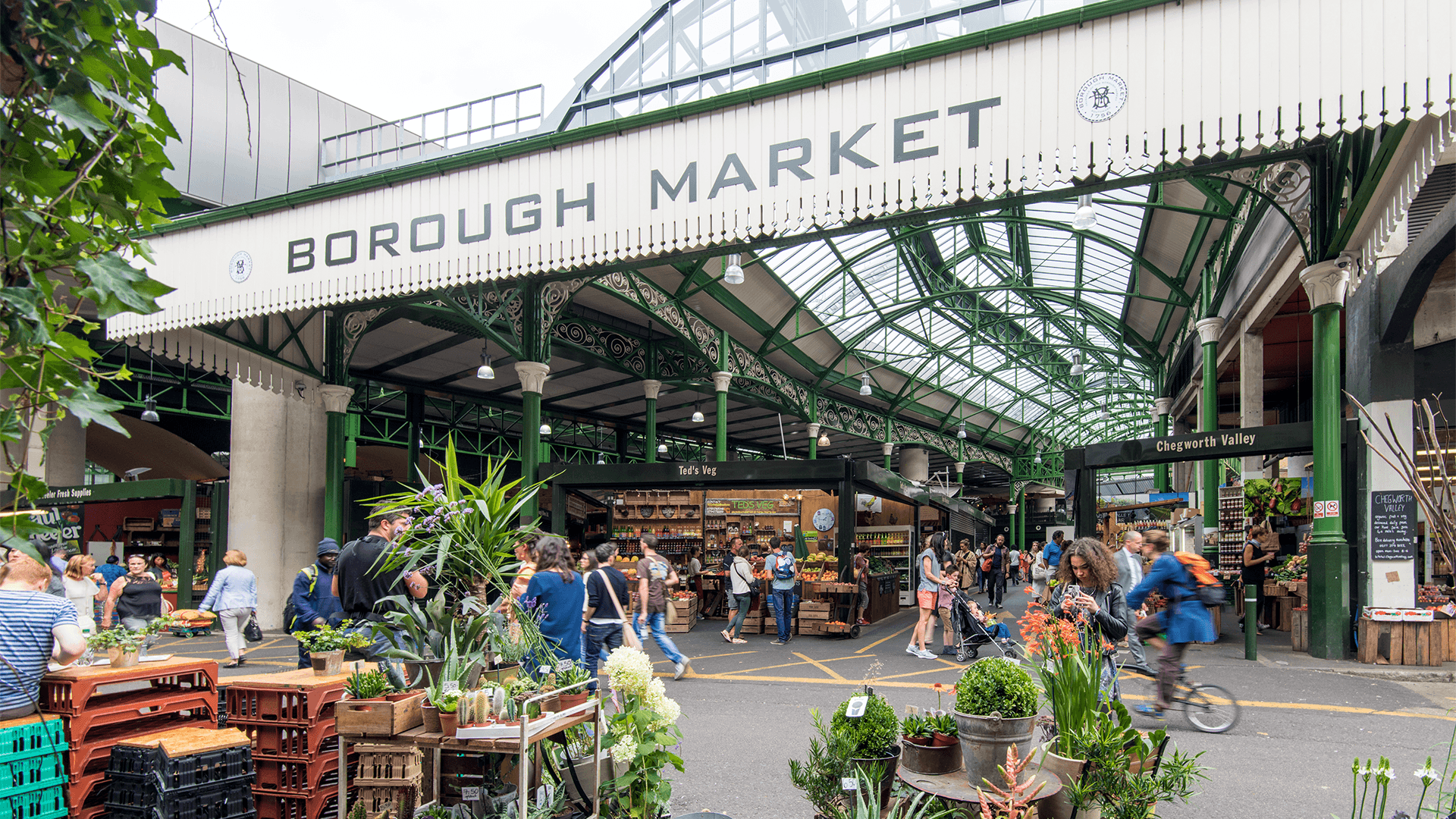 Entrance to Borough Market with vendors selling plants