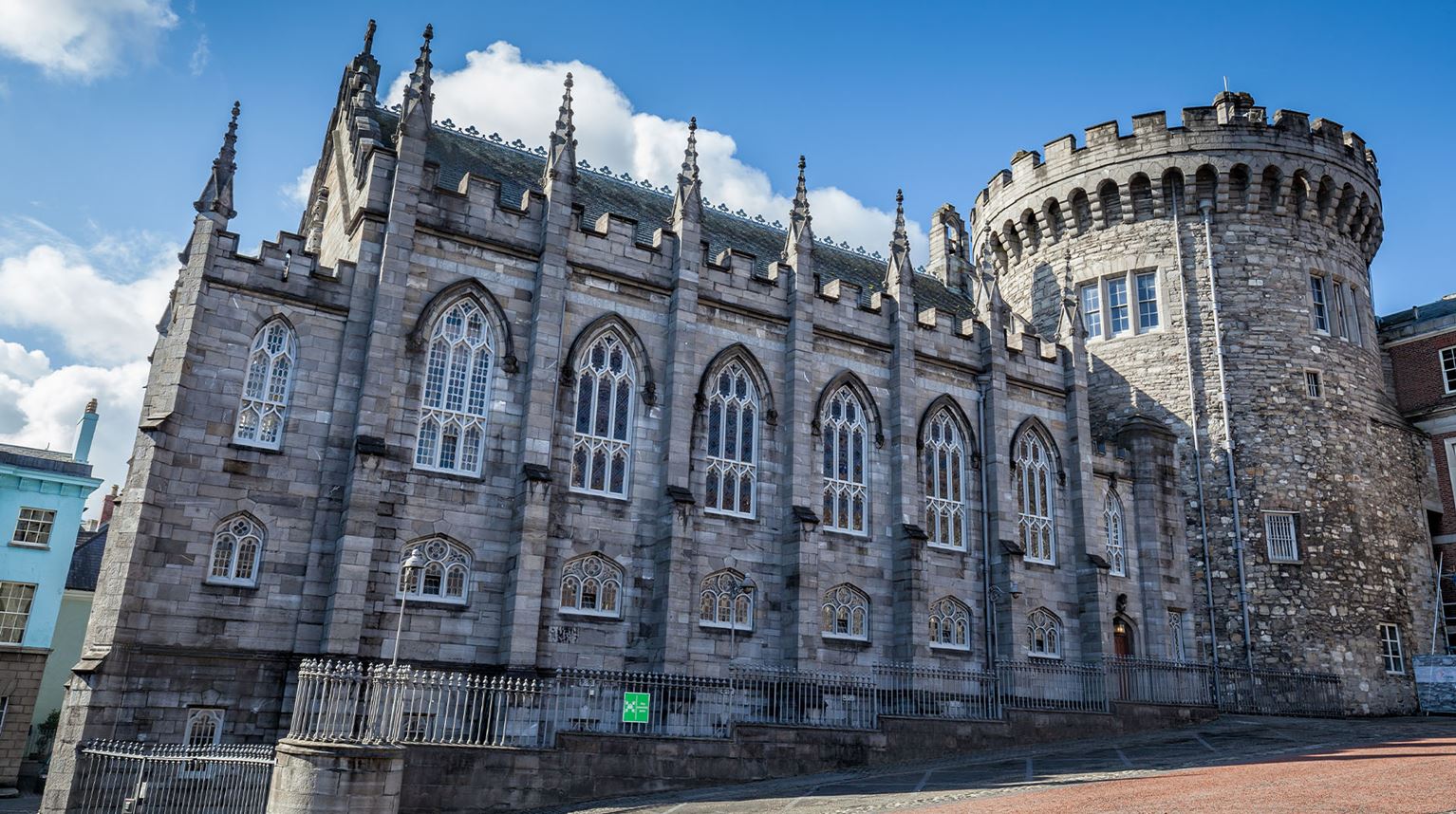 Exterior stone wall and tower of Dublin Castle.