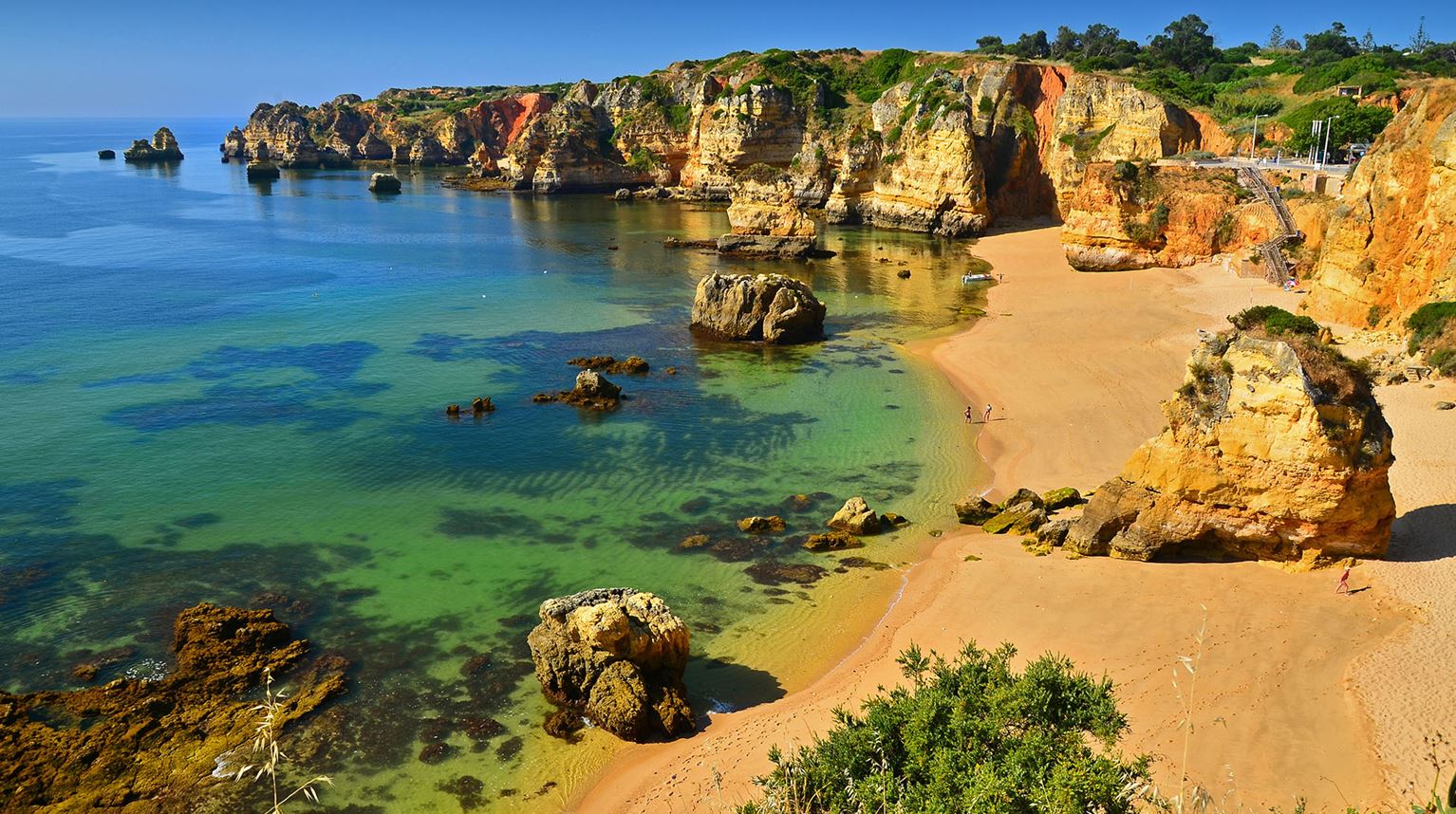 Clear water and shoreline in Dona Ana Beach, Lagos, Algarve 