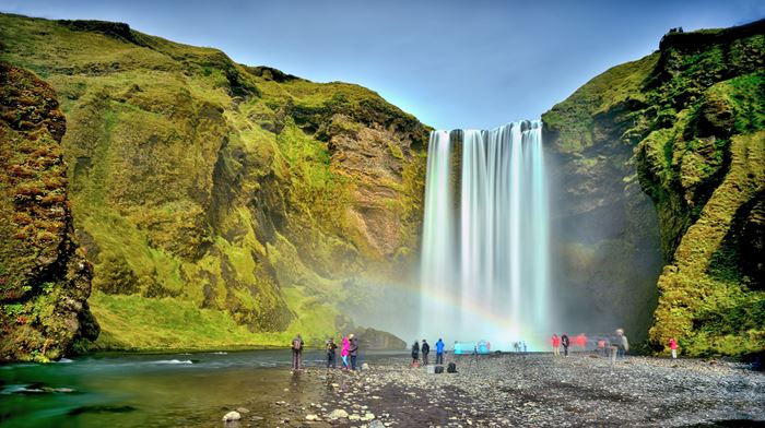 Rainbow in front of the Magestic Skógafoss Waterfall, Iceland