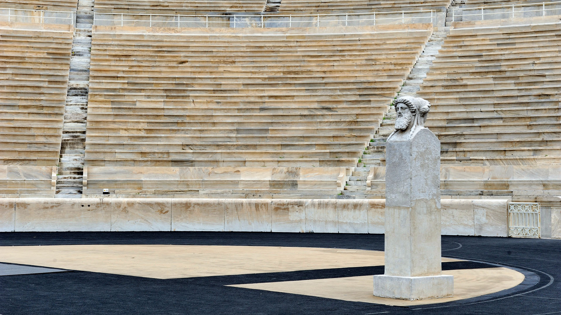 Panathenaic Stadium with stone seating and statue