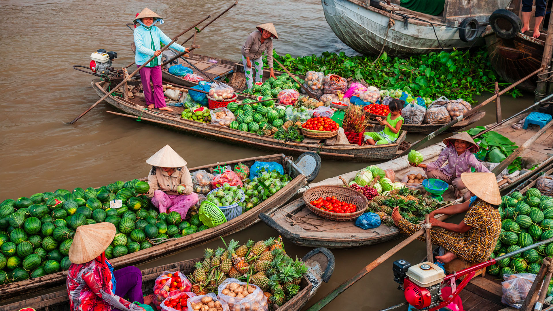 Floating fruit market on the Mekong River Delta in Vietnam. 